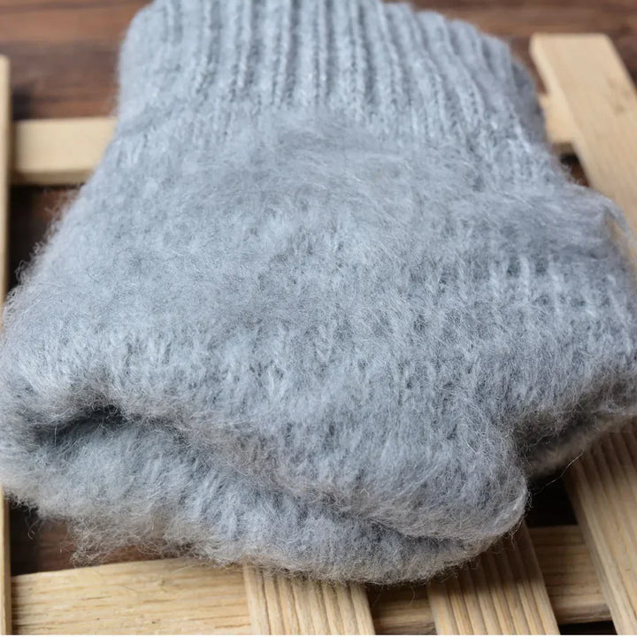 Essential winter handwear: women's knitted touchscreen gloves by Amara.