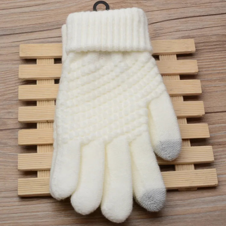 Comfortable women's touchscreen gloves, knitted, providing warmth & connectivity.