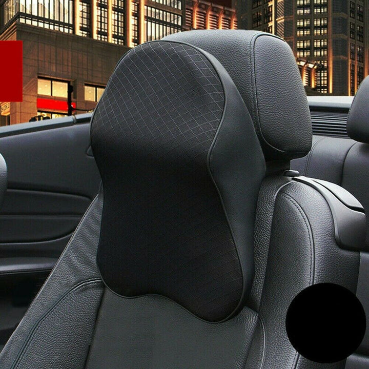 Plush unisex car seat neck support pillow for vehicle interior. Enhances driving comfort & reduces neck strain.
