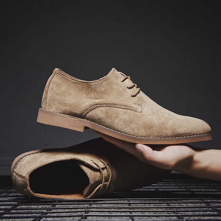 Stylish men's khaki leather lace-up Derby dress shoes, ideal for smart casual outfits or business attire.