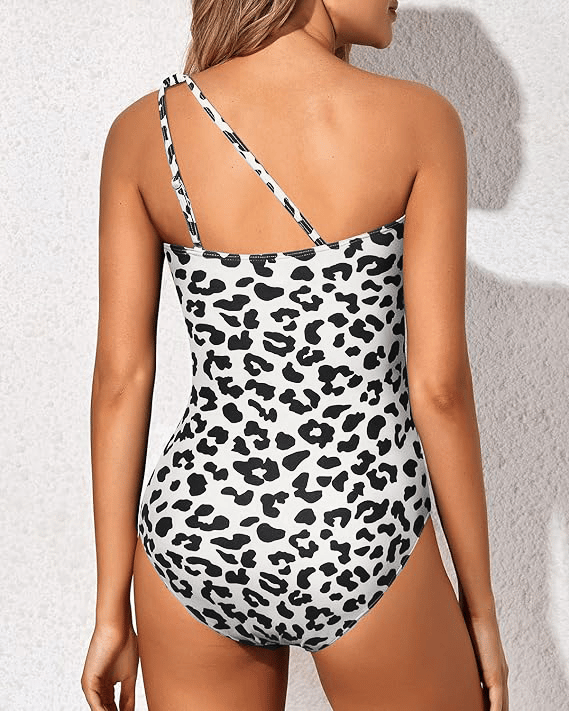 Elegant black one-shoulder tummy control swimsuit for shaping & stylish poolside fashion.