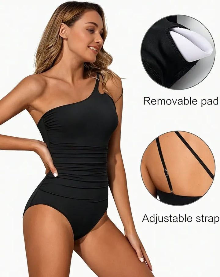 Tropical print women's one-shoulder swimsuit with tummy control feature, summer fashion.