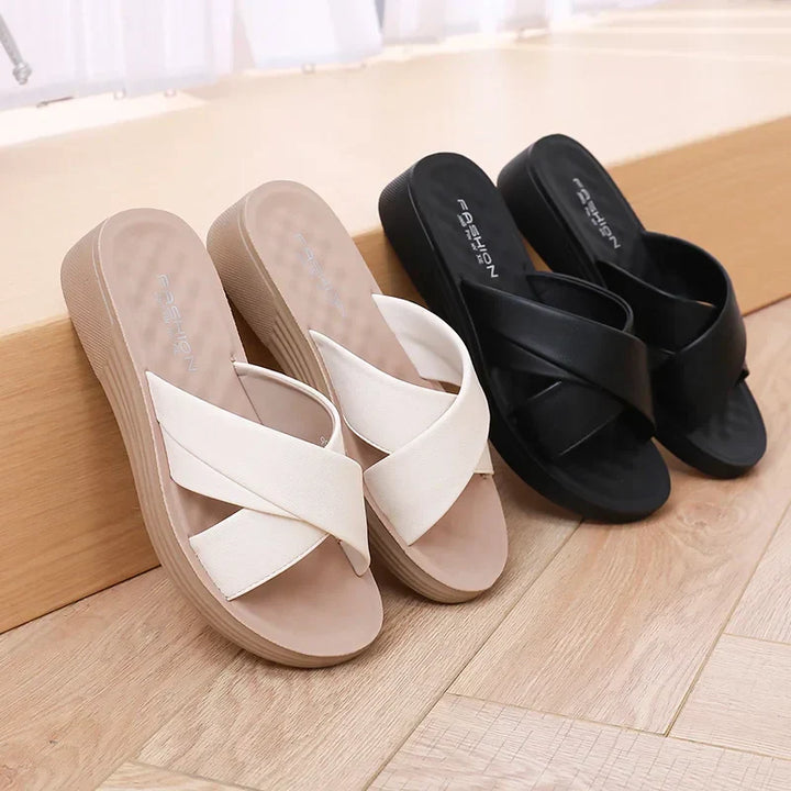 Ladies' open-toe wedge slippers. Comfortable faux leather sandals, perfect for stylish summer everyday wear.