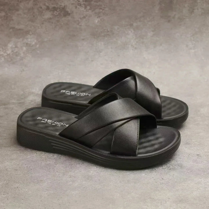 Faux leather open-toe wedge slippers for ladies. Comfortable and stylish summer sandals for women's everyday wear.