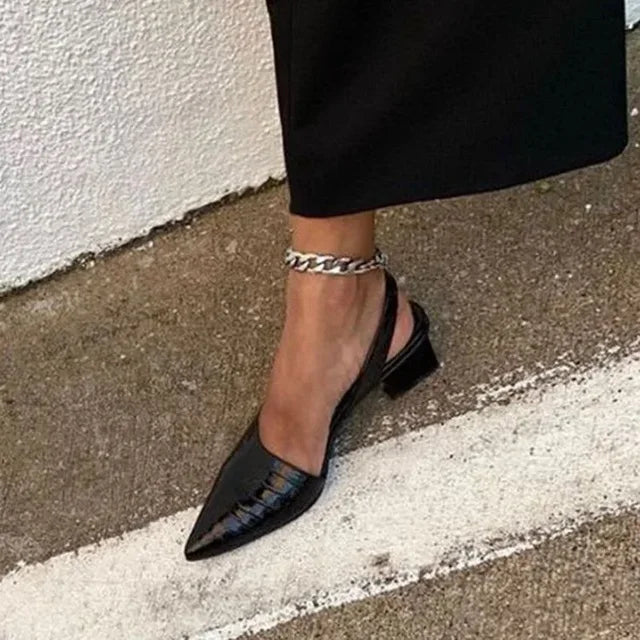 Comfortable women's orthopedic pumps with stylish croco design. Stable heel provides support for all-day wear.