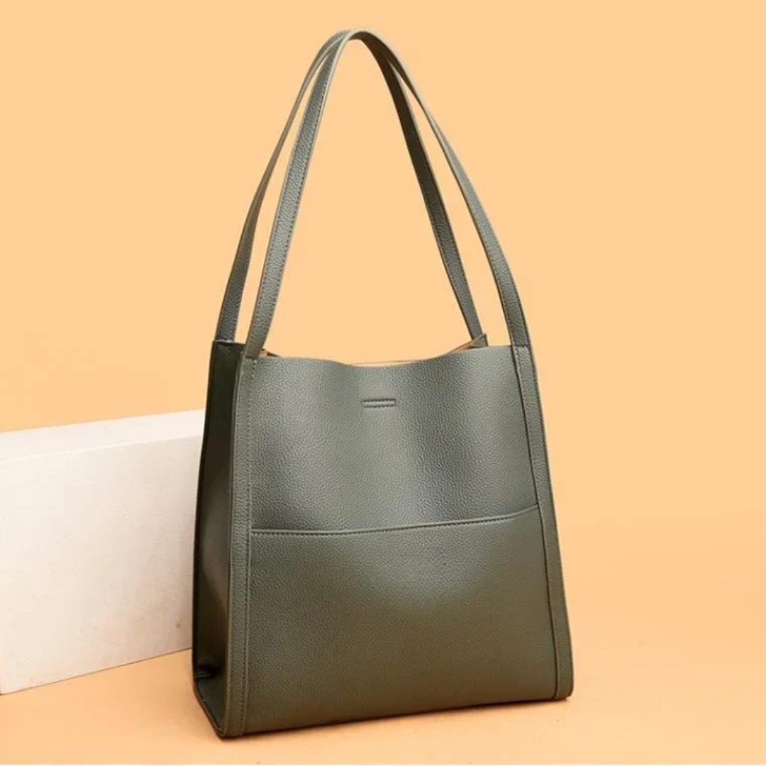 Durable black leather handbag for women. Large capacity everyday shoulder bag for all your daily essentials.
