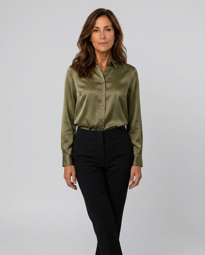 Chic long-sleeve collared blouse for women, featuring a luxurious satin-like finish. Versatile.