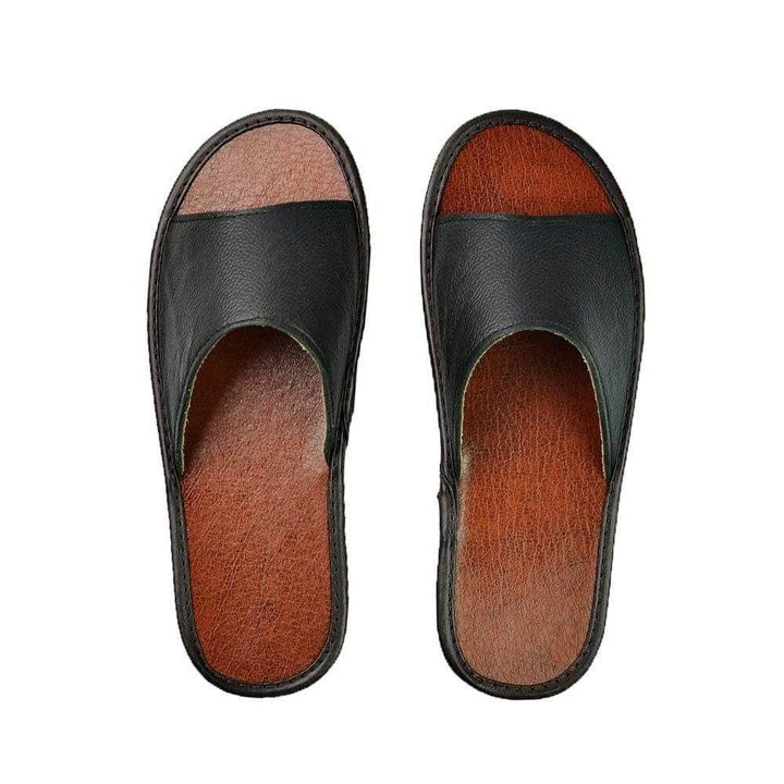 Close-up of the cushioned footbed on women's wide comfort slippers for ultimate support.
