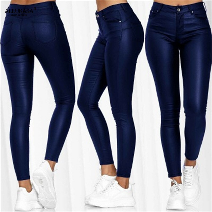 Women's high waist faux leather stretch pants, skinny & warm, essential for winter fashion.