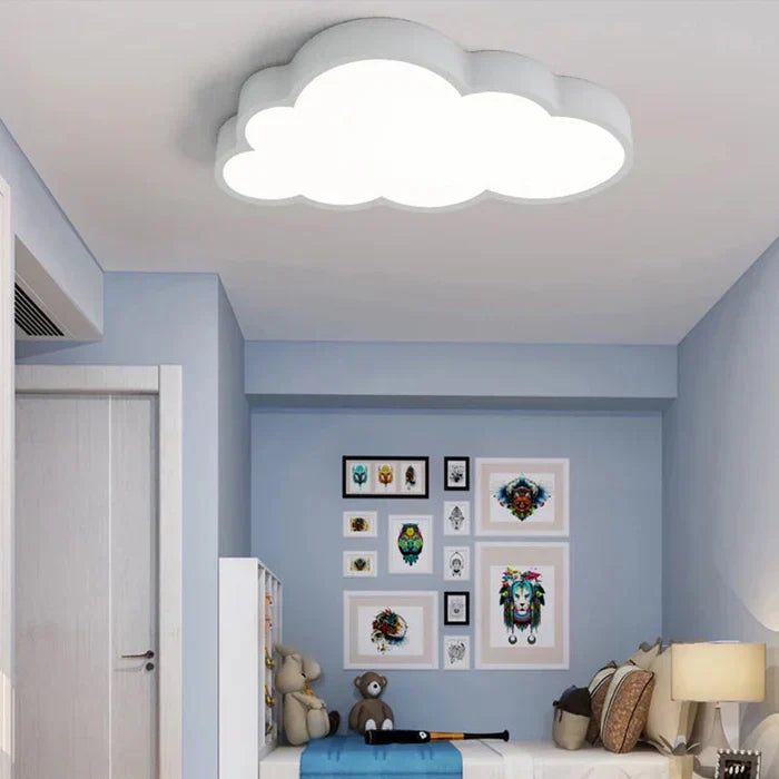 Decorative cloud LED ceiling light provides warm white illumination for any children's room, nursery, or playroom.