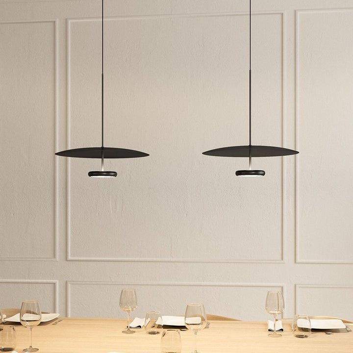 Sleek black LED hanging lamp, providing modern indirect ambient light for dining room settings.