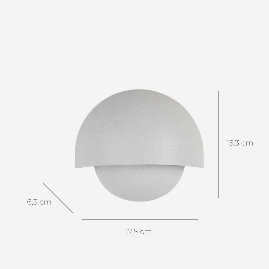 Easy-to-install wireless LED wall light with motion sensor, providing warm white ambient lighting.