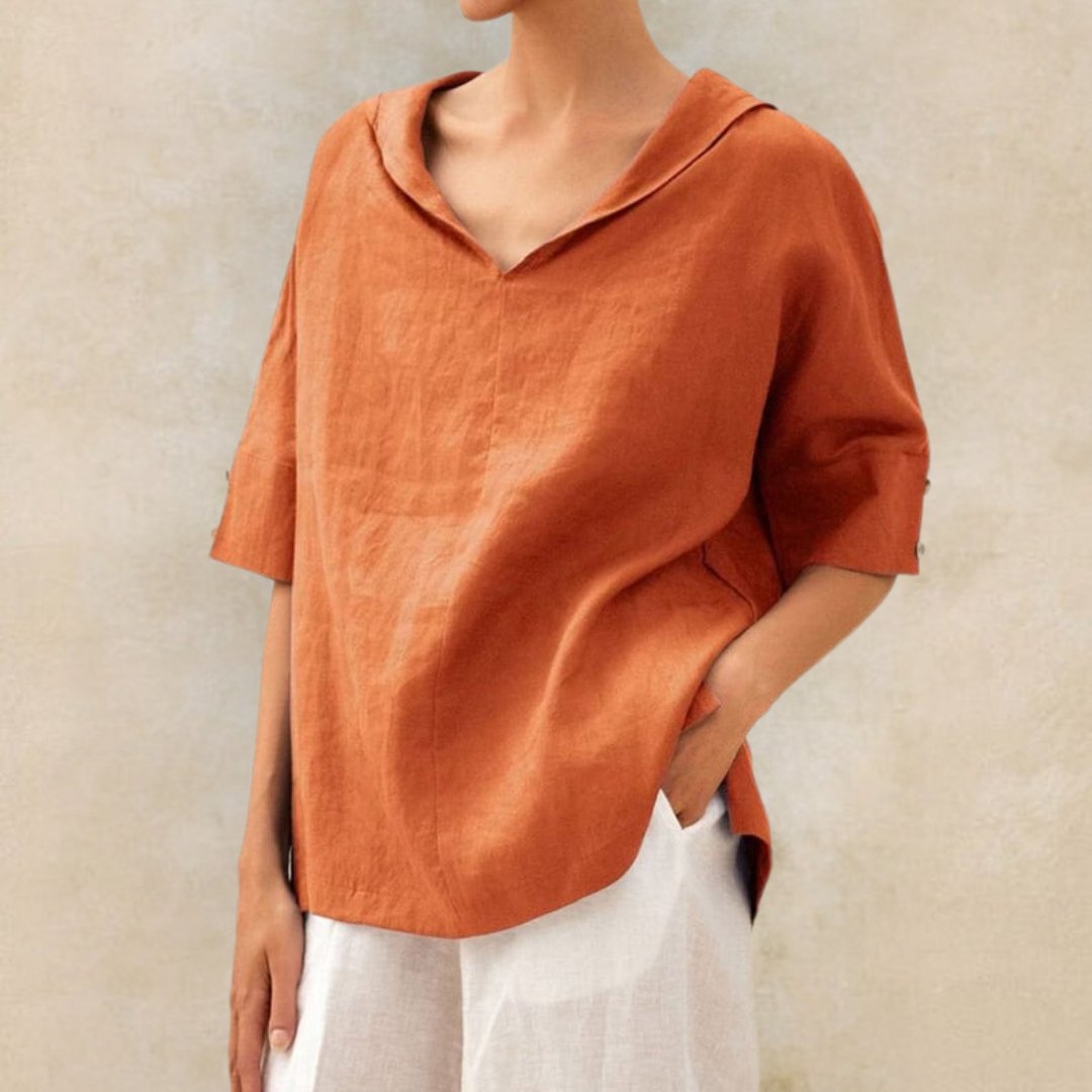 Versatile women's V-neck blouse, short sleeve, ideal for office casual or a comfortable summer look.