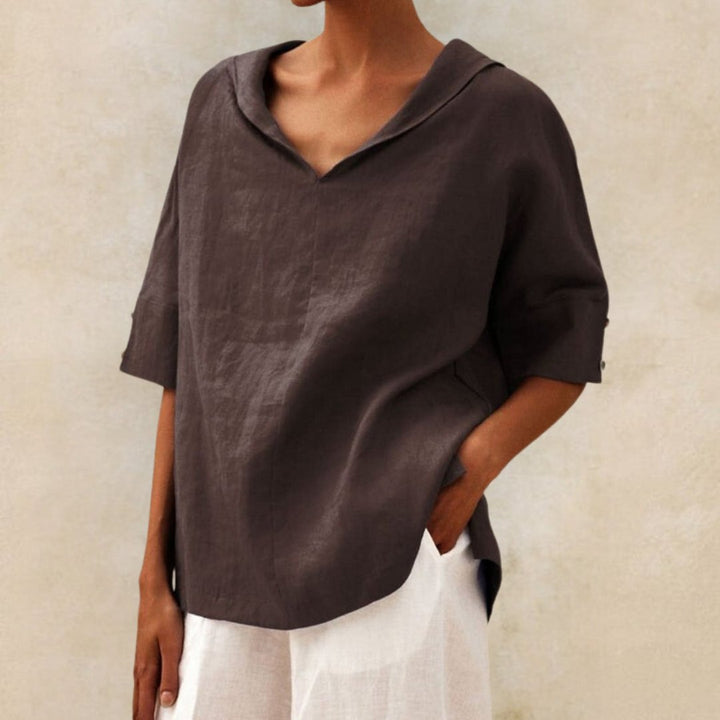 Lightweight women's V-neck top, comfortable loose fit for casual summer days and chic everyday fashion.