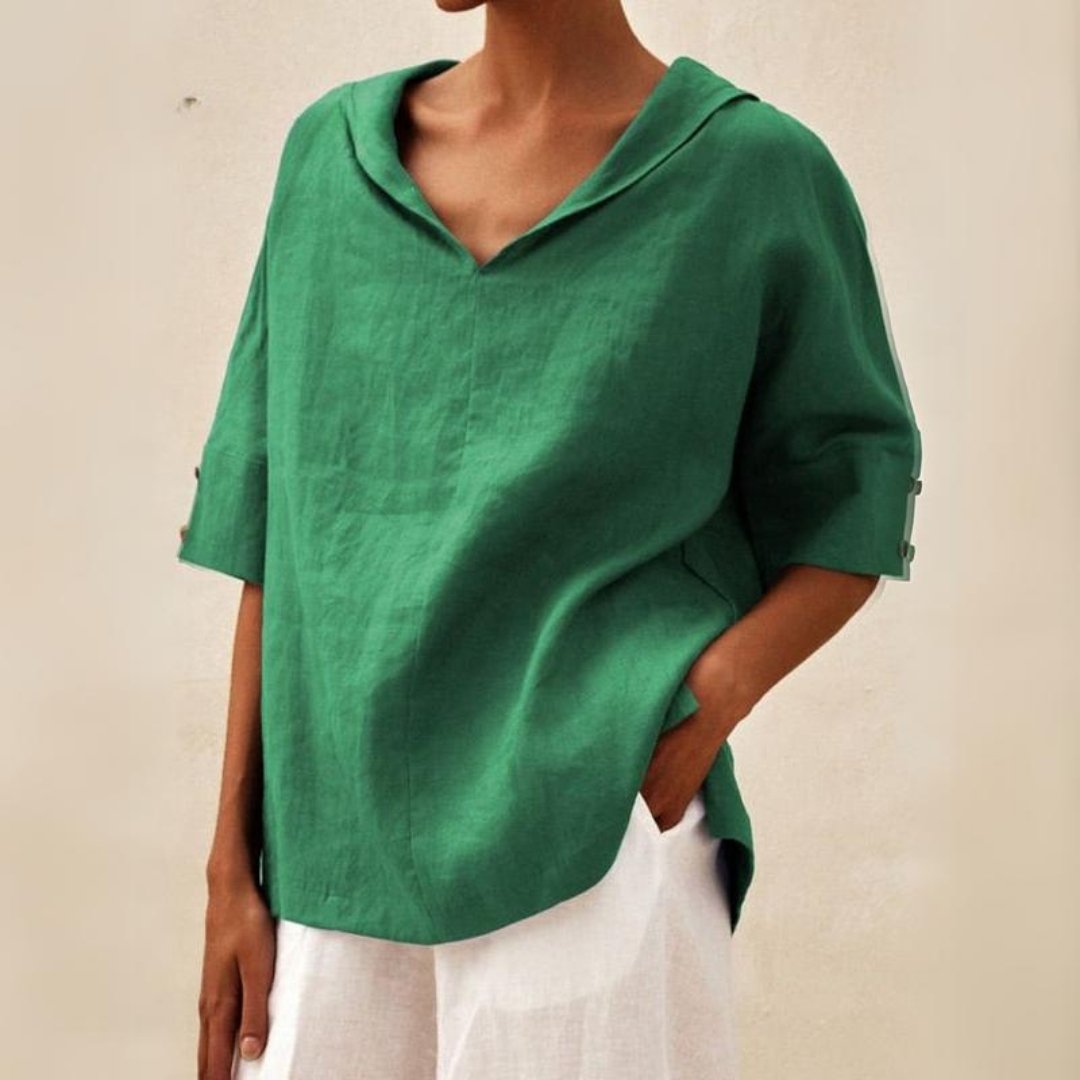 Chic women's V-neck top, comfortable loose fit short sleeve blouse for relaxed summer style and comfort.