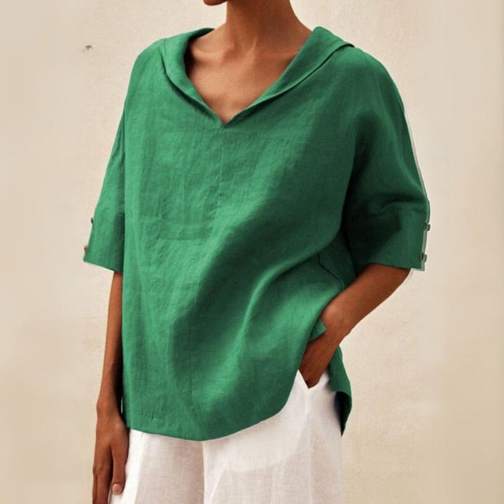 Chic women's V-neck top, comfortable loose fit short sleeve blouse for relaxed summer style and comfort.