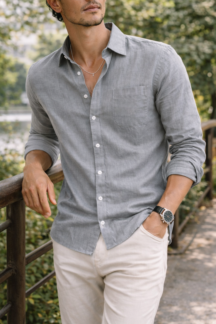 Elegant men's casual shirt with a classic collar & long sleeves, perfect for versatile smart casual outfits.
