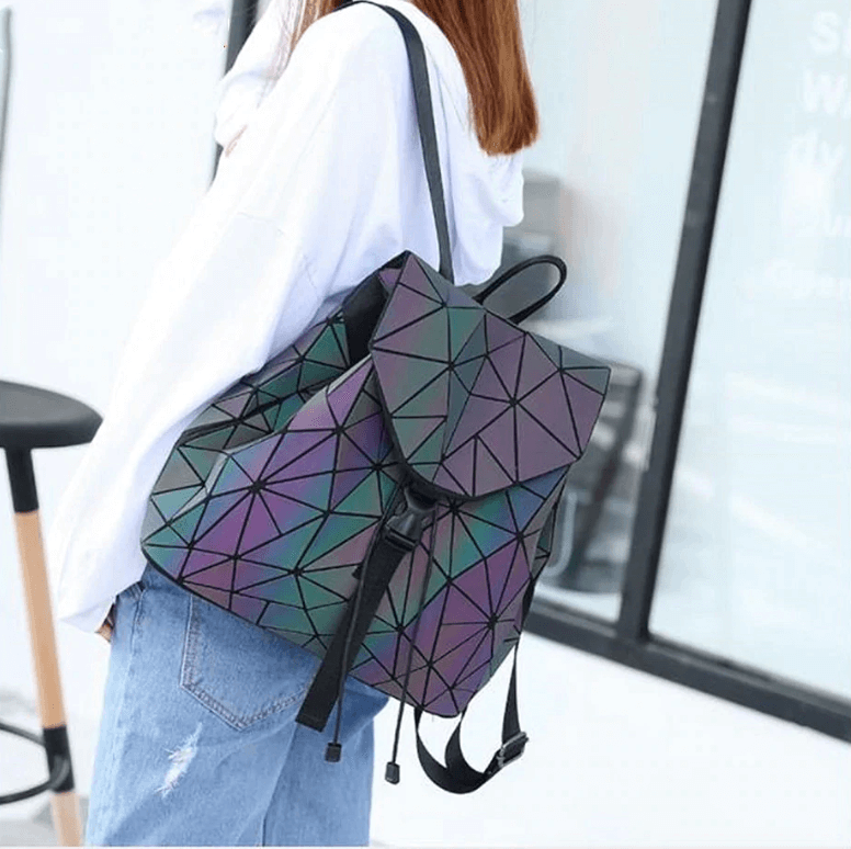 Urban style women's travel backpack, featuring a reflective geometric design & color-changing effect.