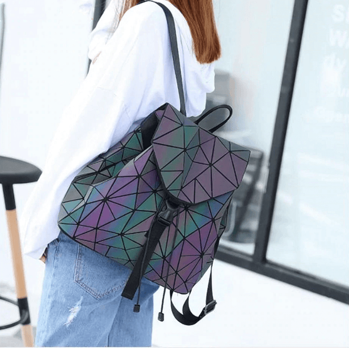 Urban style women's travel backpack, featuring a reflective geometric design & color-changing effect.
