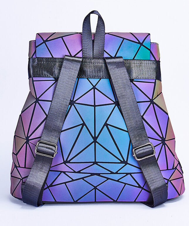 Modern reflective women's backpack, geometric pattern shifts colors. Great as a travel or school bag.