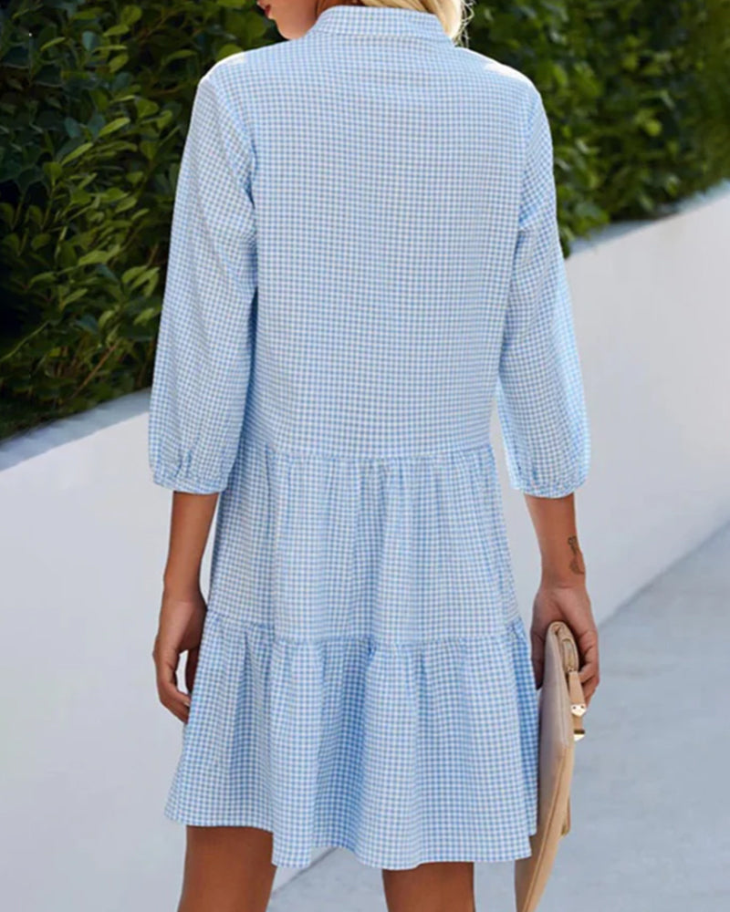 Light women's A-Line summer dress featuring a classic checked pattern and flattering V-neck design.