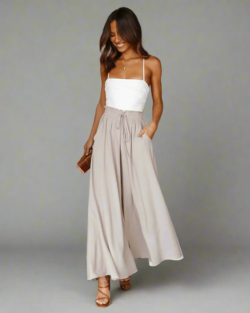 Packable high waist women's summer pants, ultra-comfortable flowy trousers for travel, beach, and leisure.