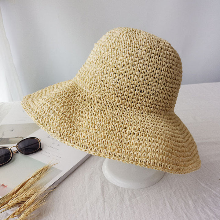 Women's breezy retro flat brim summer hat for stylish sun protection at the beach or during travel.