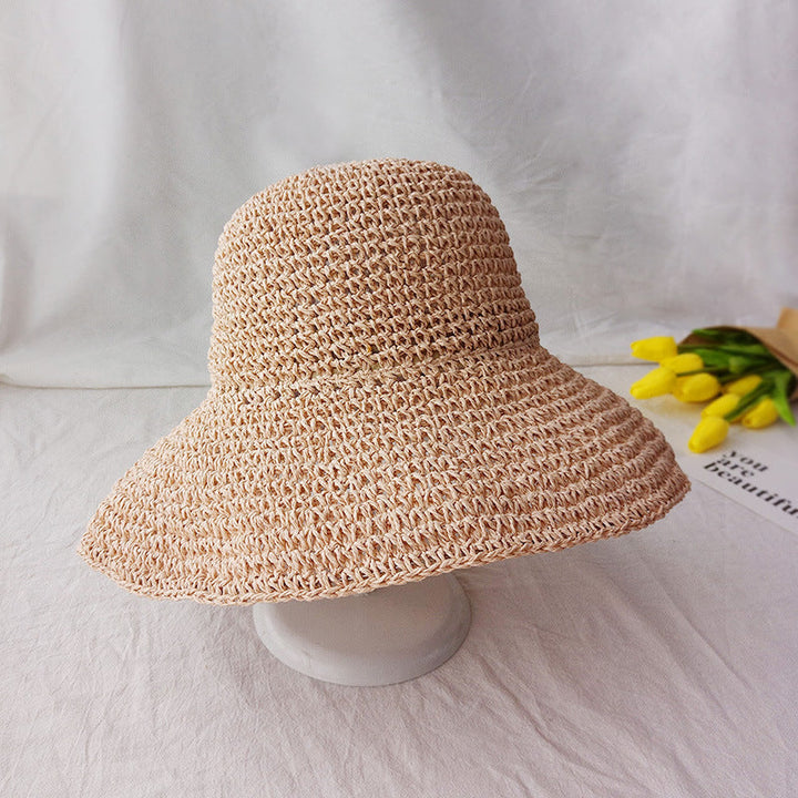 Travel-friendly women's lightweight retro flat brim hat, essential for summer sun protection and style.