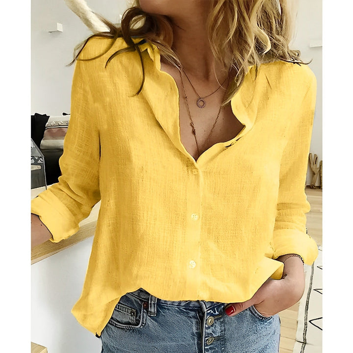 Soft, lightweight women's button-up shirt with a relaxed fit. Effortless long sleeve blouse for women.