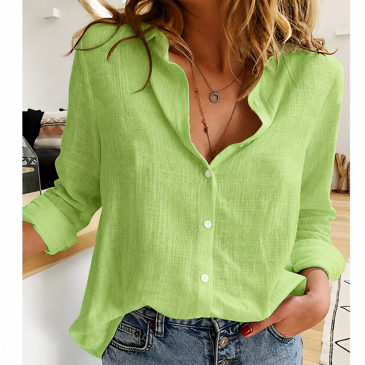 Women's everyday wear blouse: relaxed fit, lightweight long sleeve button-up shirt for casual style.