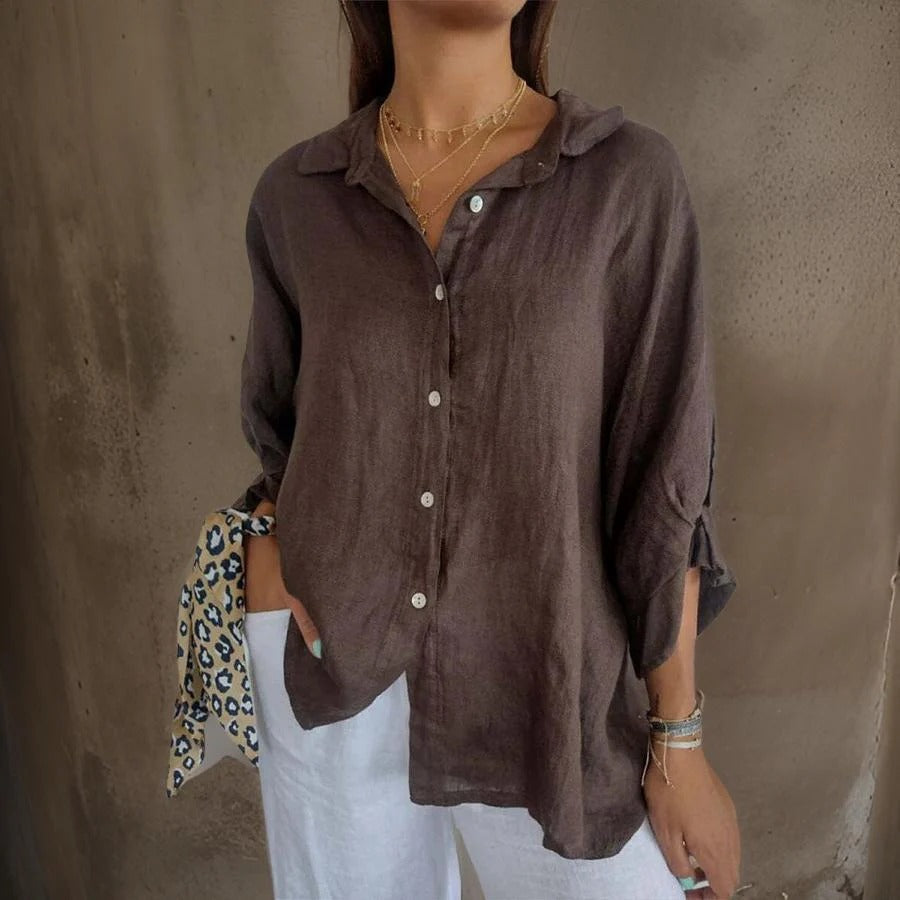 Women's sophisticated relaxed fit linen shirt with rolled cuffs, perfect for casual everyday wear.