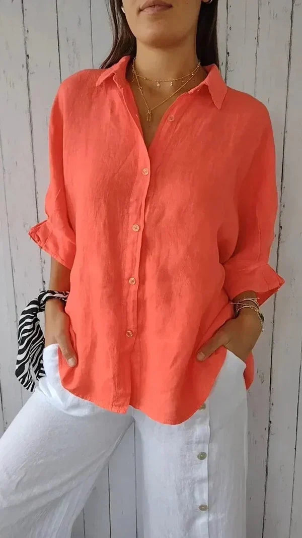 Navy women's casual linen shirt, long sleeve and relaxed fit with stylish rolled cuffs, great for everyday wear.