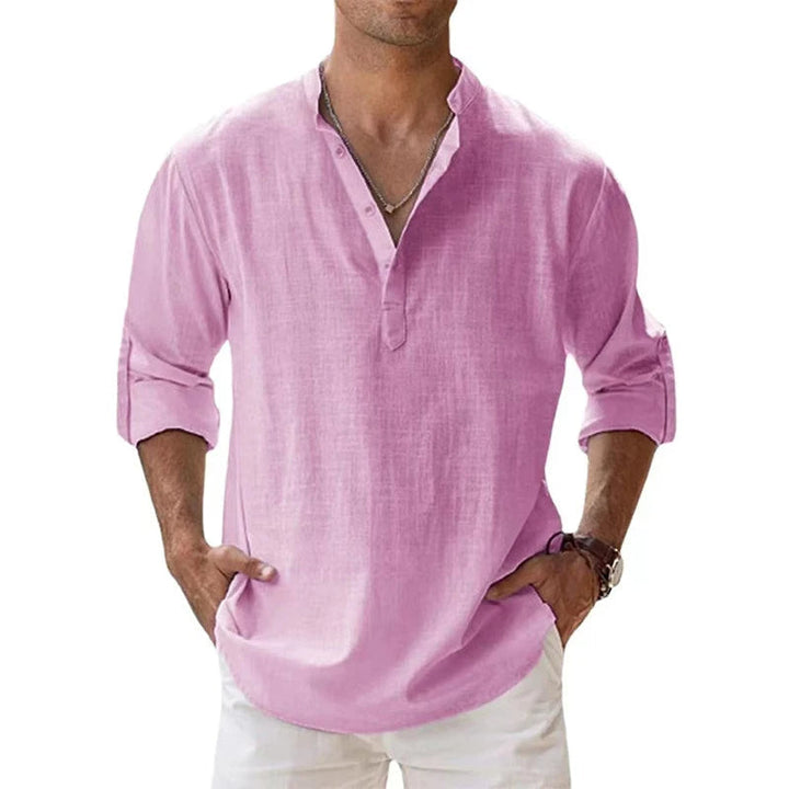 Man enjoying casual style in a comfortable, relaxed fit long sleeve Henley shirt.