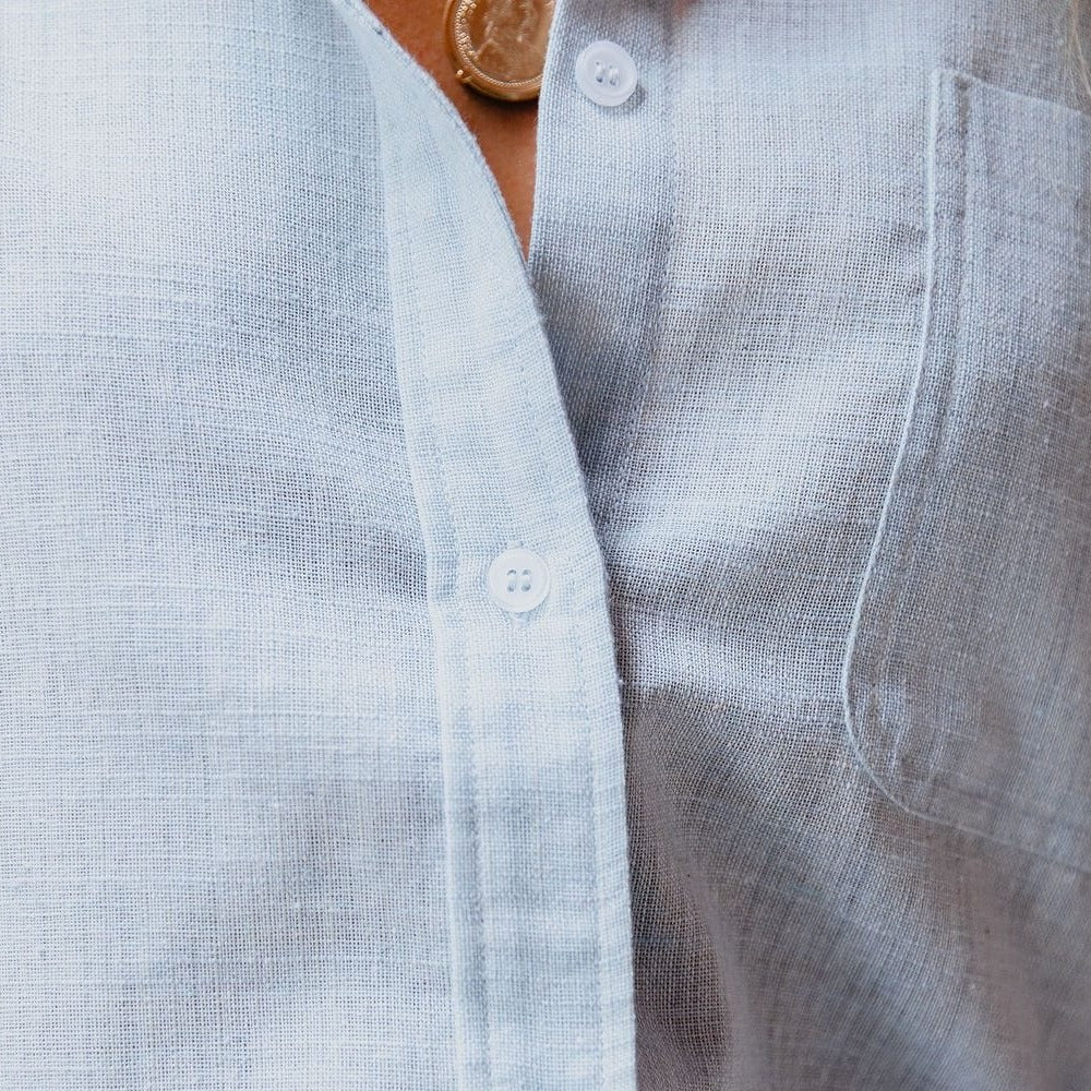 Classic Malani women's button-up blouse with a stylish stand-up collar, chest pocket, perfect for everyday.