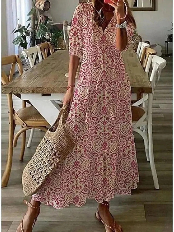 Casual yet elegant women's long boho dress with a captivating leaf pattern, great for spring outings and comfort.