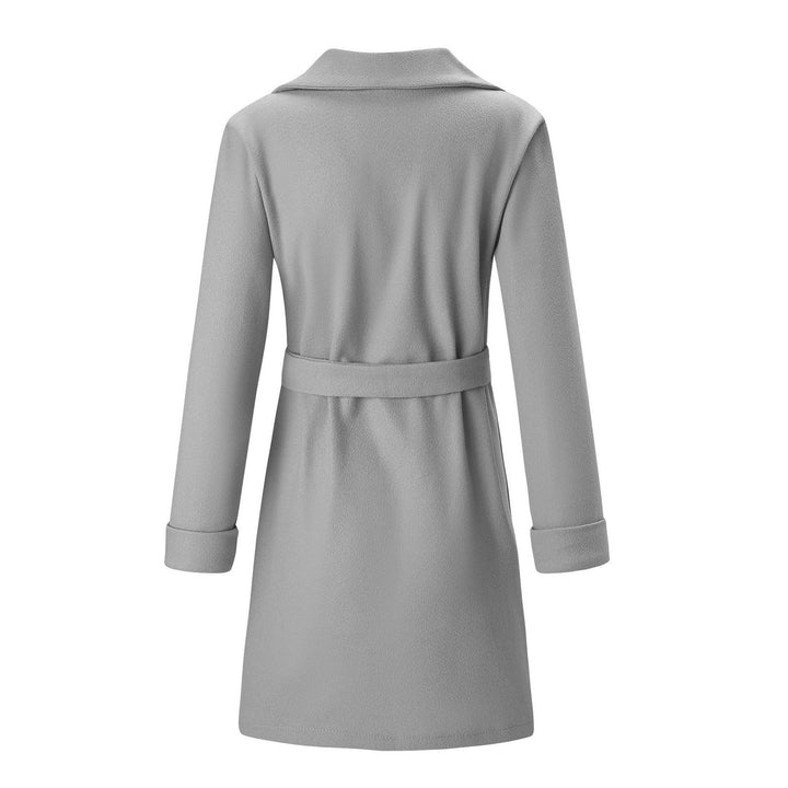 Trendy women's longline double-breasted coat. Cozy wool-look jacket for elegant winter style.
