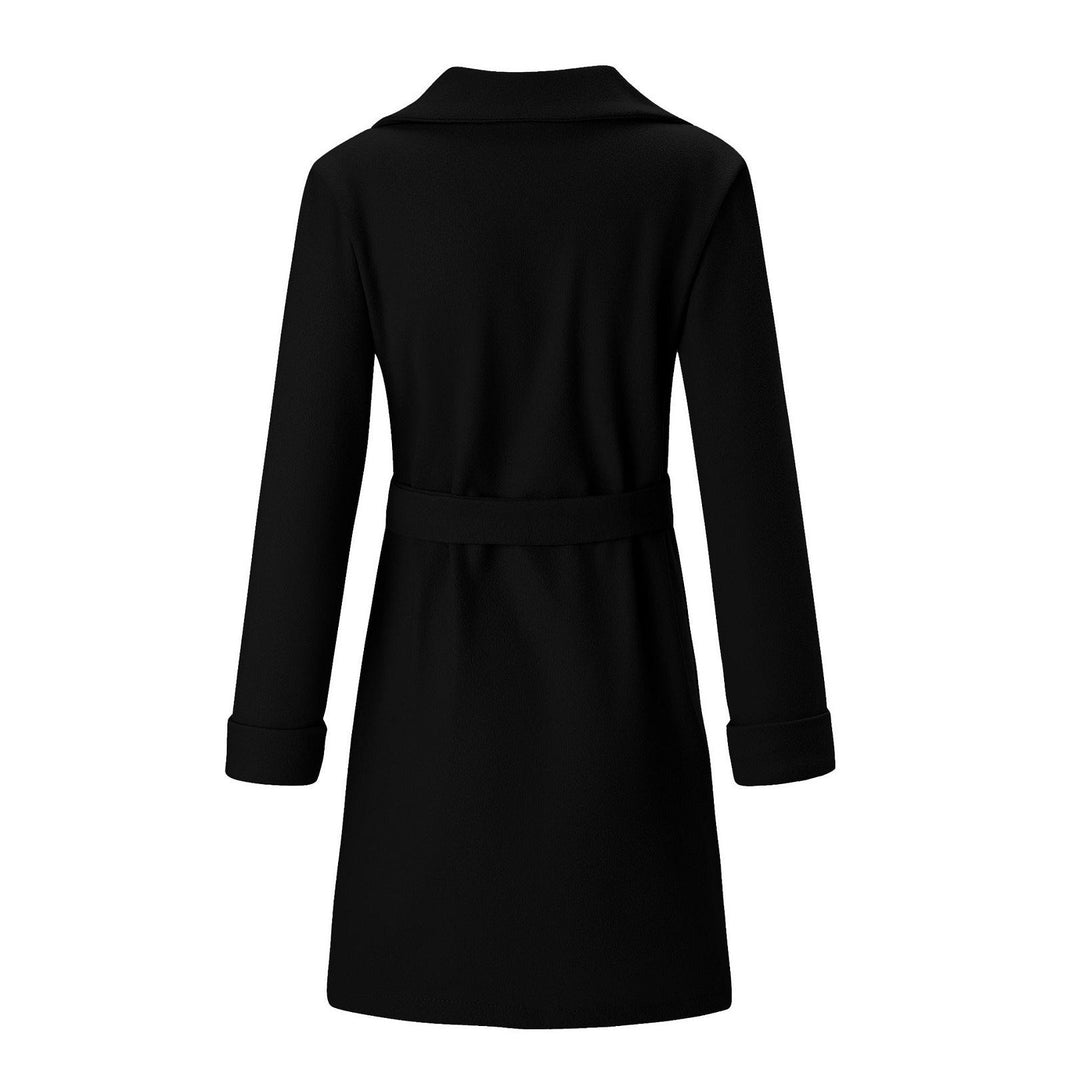 Warm women's double-breasted longline winter coat. Providing elegant, cozy outerwear for cold weather.