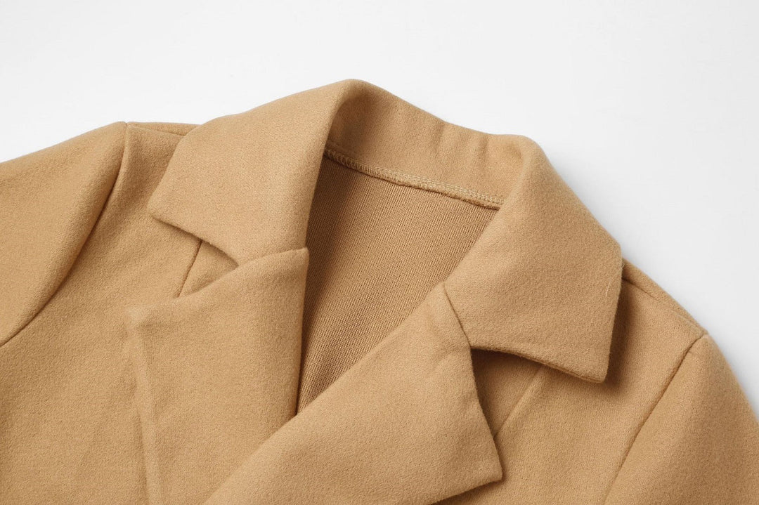 Elegant Elise women's double-breasted longline coat. Trendy wool-look jacket for stylish winter outfits.