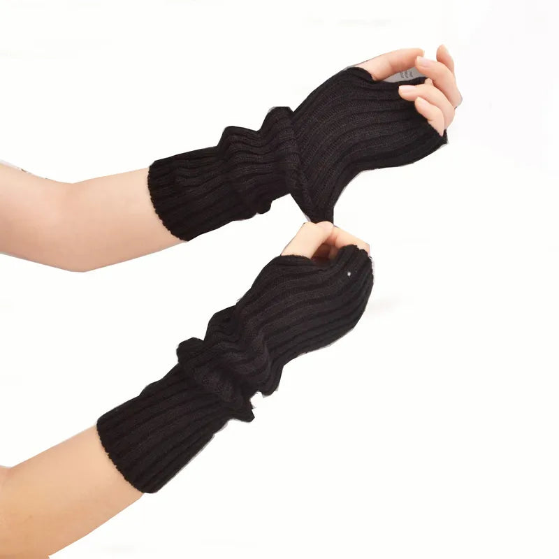 Soft, cozy women's long fingerless knitted gloves. Ideal winter accessory for warmth and style.