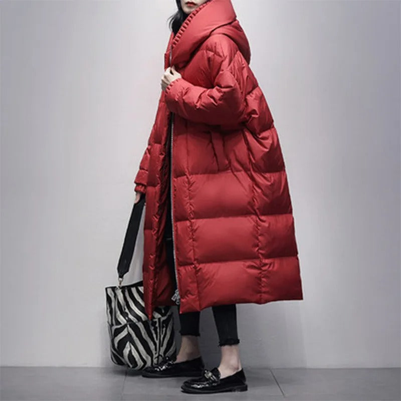 Elegant women's Amara long padded winter jacket, a cozy and stylish outerwear choice for winter fashion.
