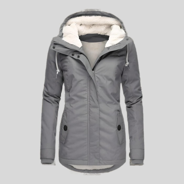 Stylish women's long winter coat with a cozy hood. Thick, warm outerwear perfect for cold weather fashion.