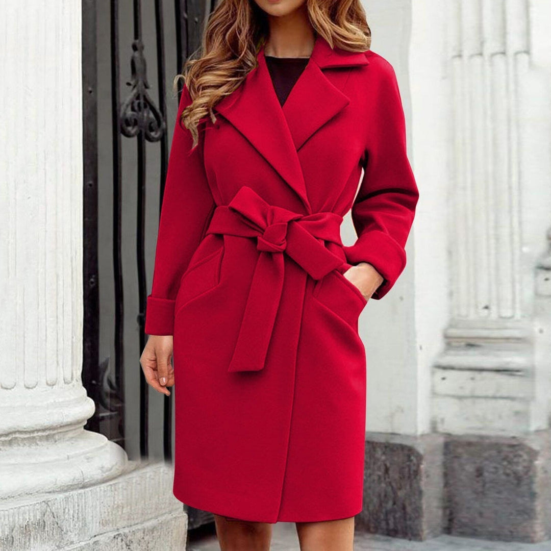 Stylish women's Sienna long trench coat, warm winter outerwear for a chic look in cold weather.