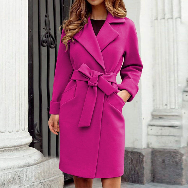 Elegant women's long Sienna winter trench coat, warm & stylish outerwear designed for cold weather fashion.