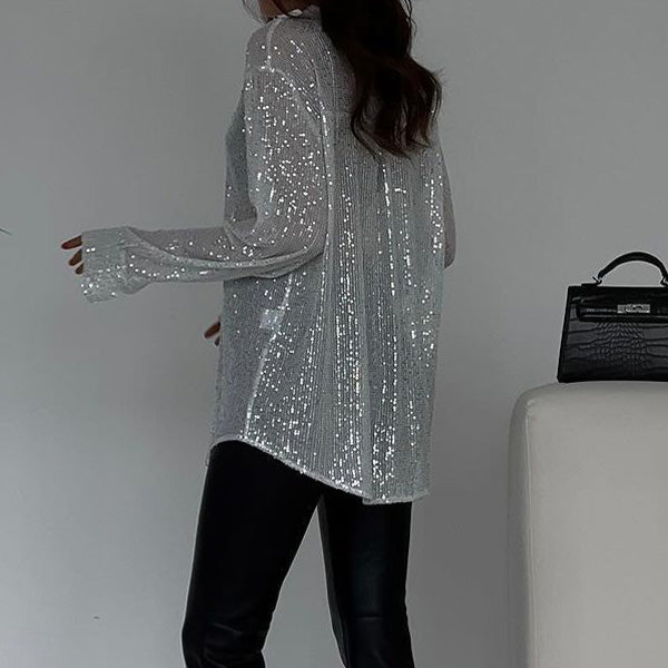 Women's sequin party top, loose fit design. Dazzling glitter shirt, perfect for holiday outfits & evening wear.
