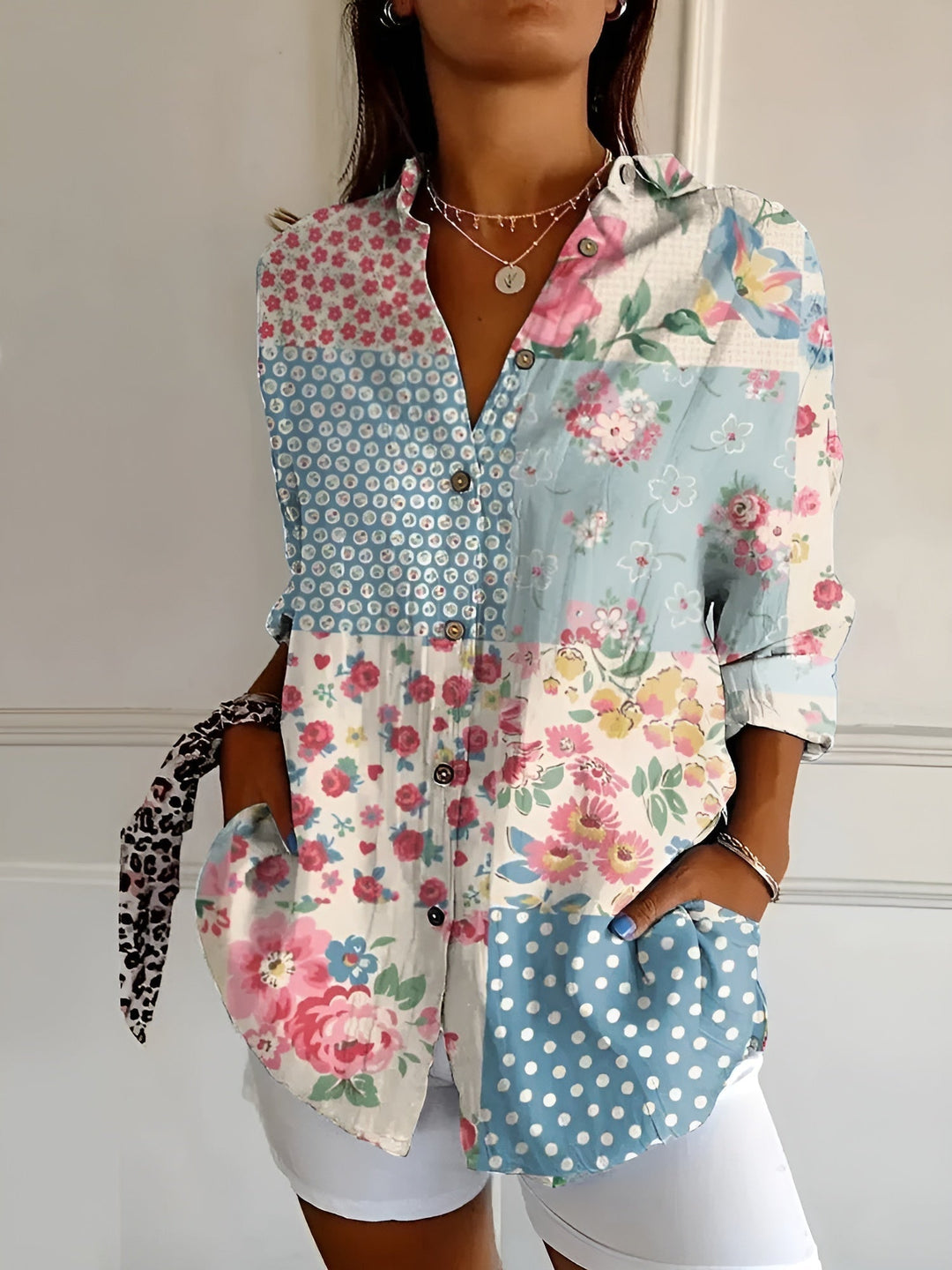 Soft women's floral print relaxed button-up top, a breathable 3/4 sleeve blouse for summer fashion.