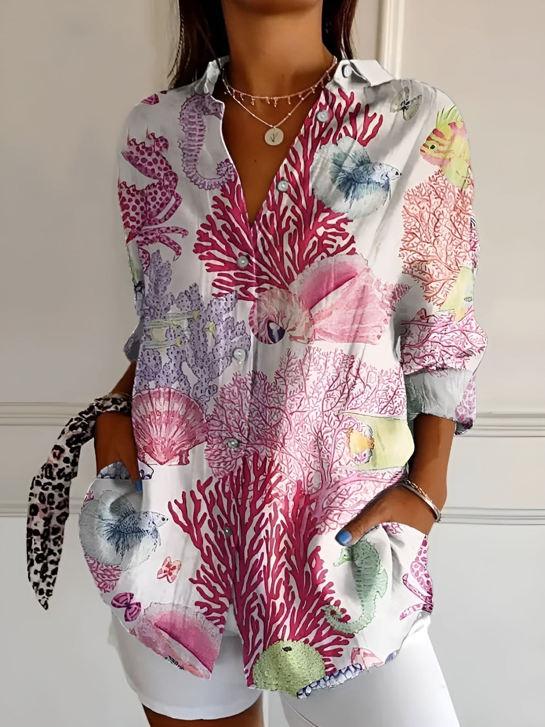 Stylish women's floral print relaxed button-up blouse, an everyday fashion 3/4 sleeve casual shirt.