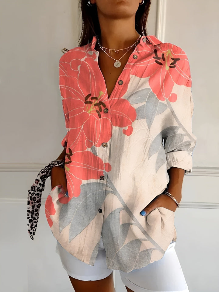 Lightweight women's floral print relaxed button-up blouse, perfect as a 3/4 sleeve summer top.