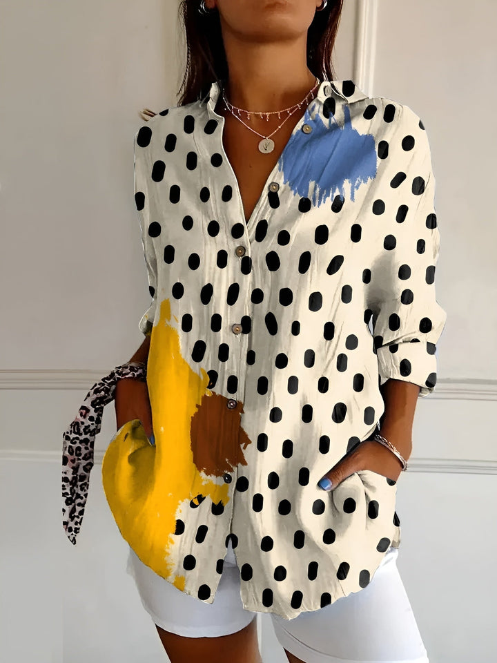 Relaxed fit women's floral print button-up shirt, a comfortable and stylish 3/4 sleeve summer blouse.