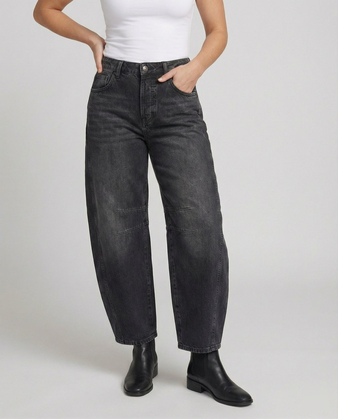 Versatile women's mid-rise barrel jeans, relaxed fit for everyday style and casual fashion.