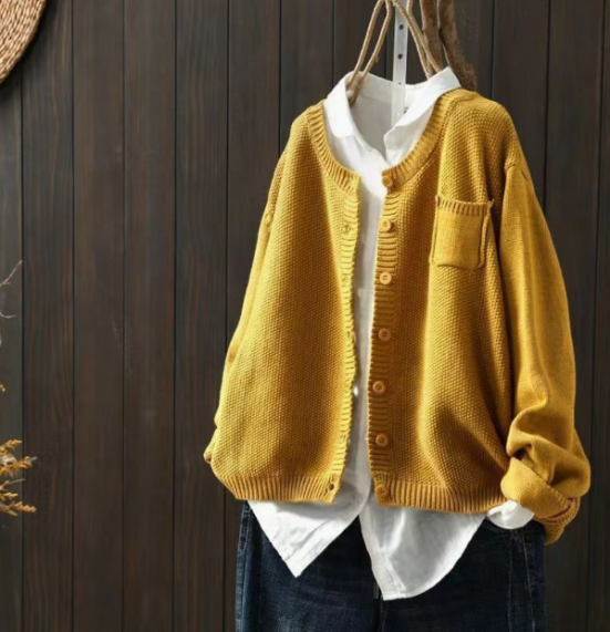 Stylish women's button-up long-sleeve cardigan, oversized fit, perfect for cozy fall fashion & layering.